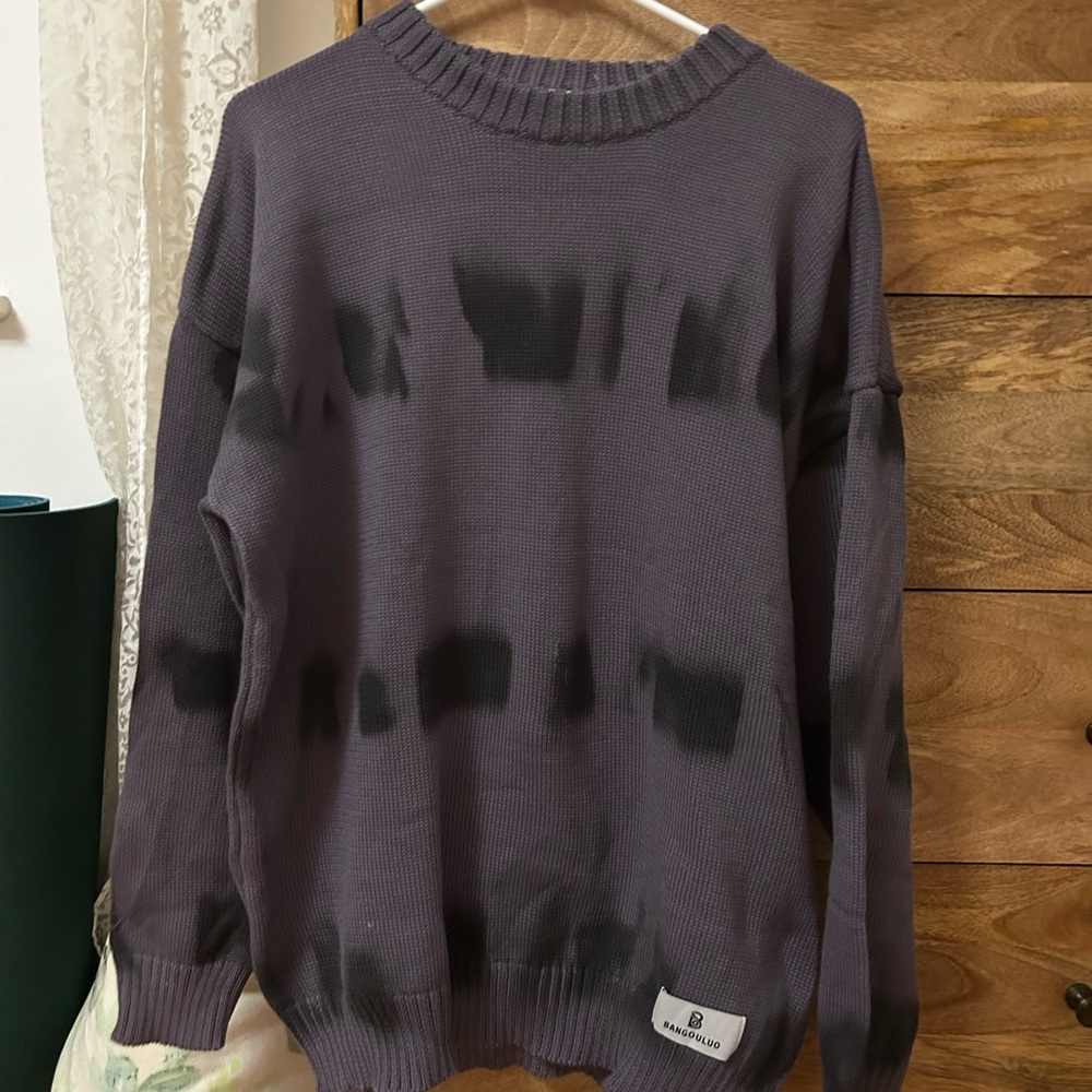 Purple and black knit sweater